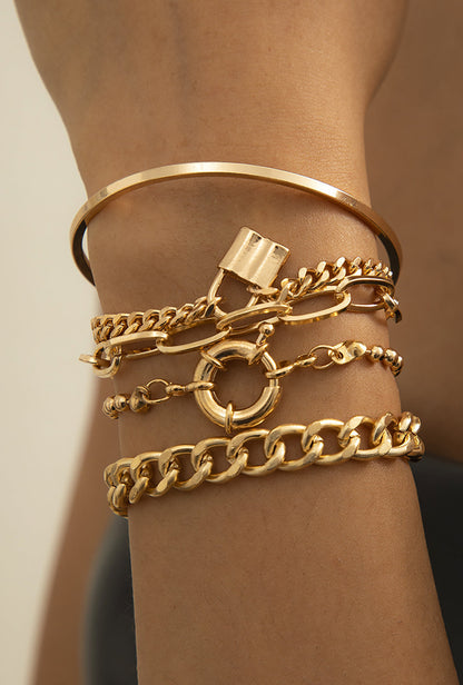 SET OF GOLDEN LAYERED BRACELETS